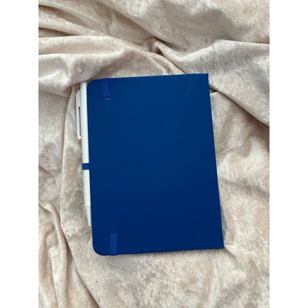 Ex nihilo brand notebook and pen